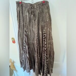 Cotton flared skirt. Multi brown print, fully lined elastic +draw string waist.
